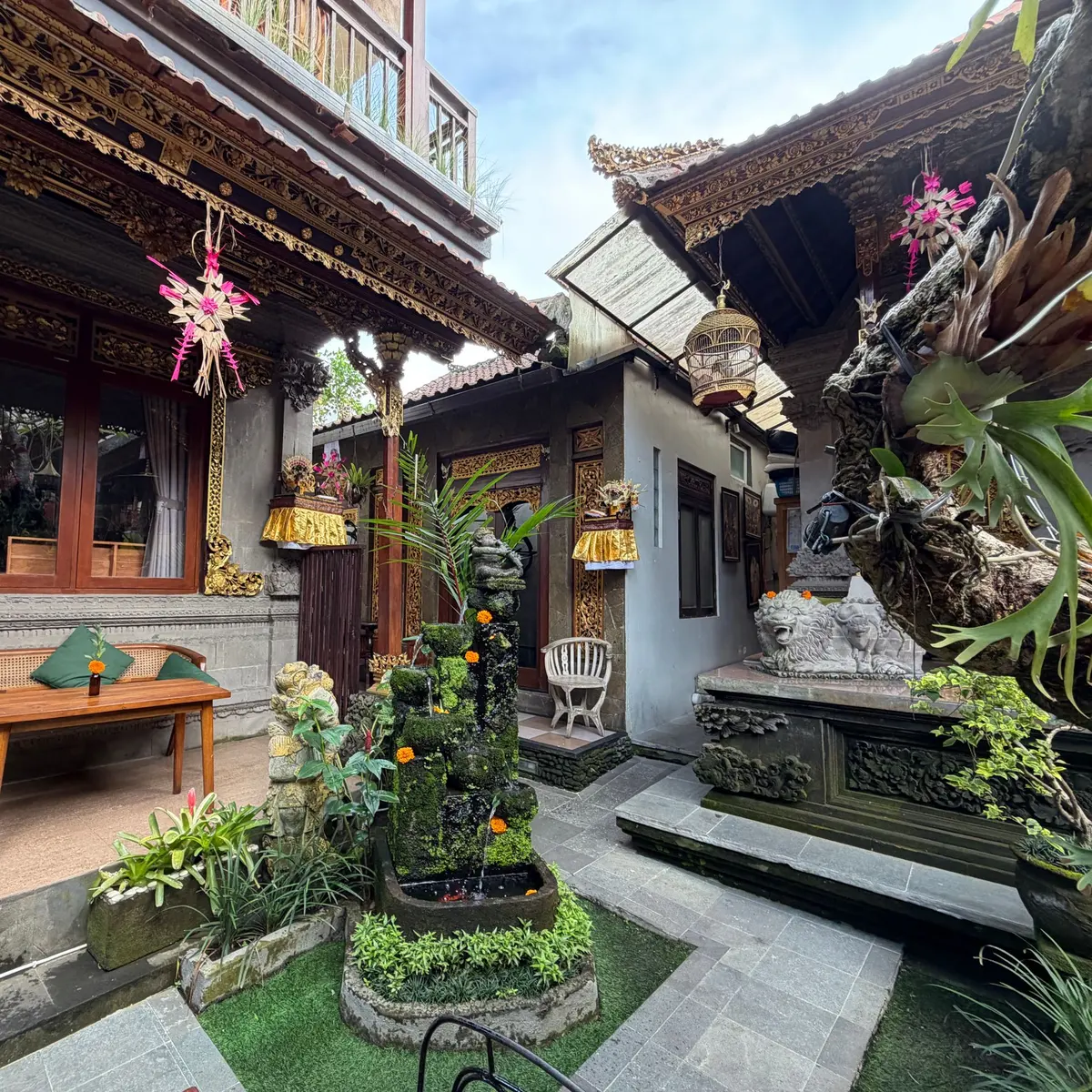 Balinese family courtyard with a shrine and plants