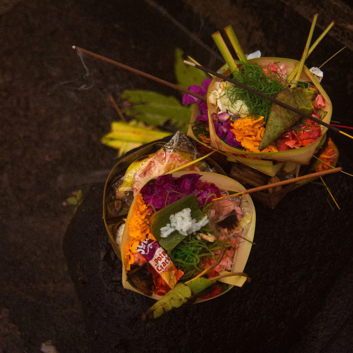 Balinese canang sari offering with flowers
