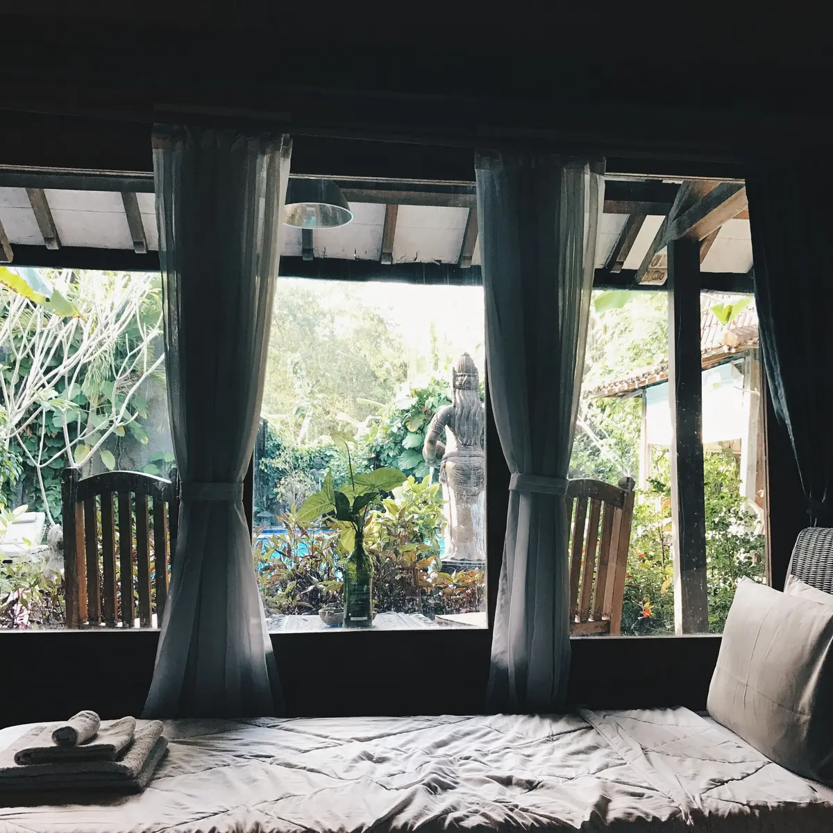 Bedroom window looking onto a garden